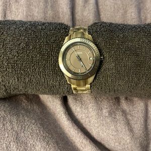 Blond, tortoise shell watch